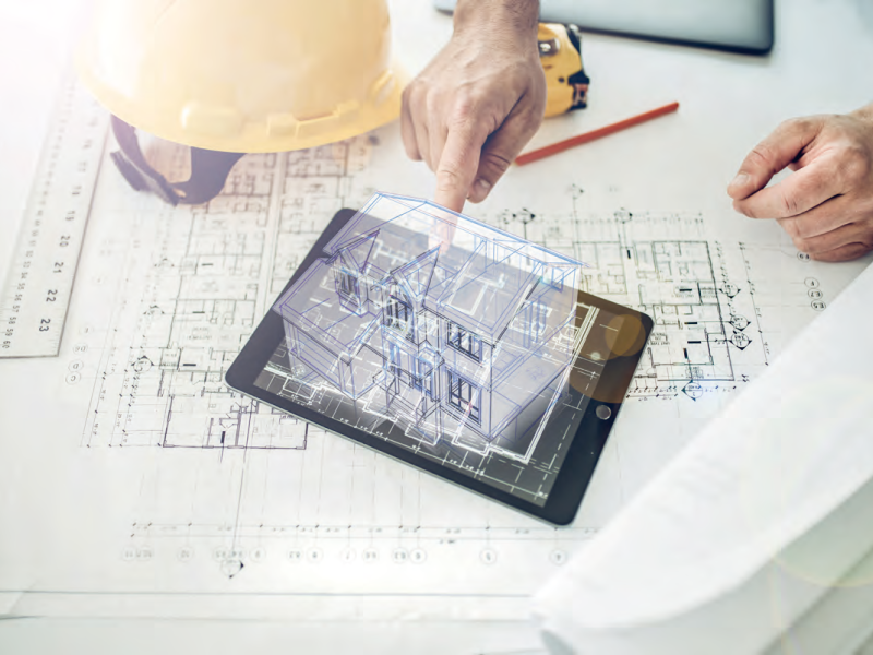 Illustration von Gebäudeplanung am Reißbrett und mit digitalem Modell
