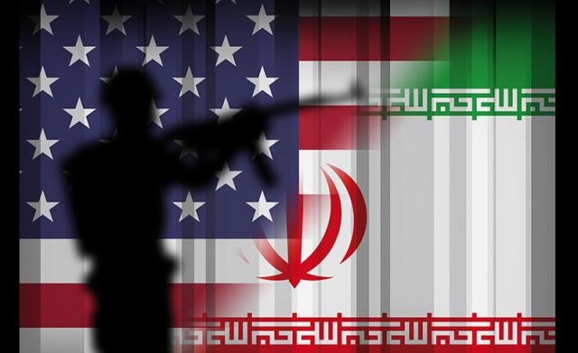 Silhouette eines Soldaten vor US- und Iran-Flaggen