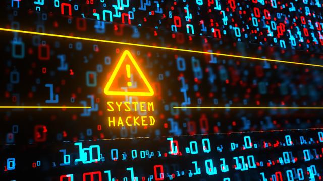 Computerscreen mit Schriftzug System hacked